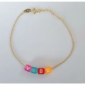 PULSEIRA BOLINHAS COM LETRAS COLORIDAS VIBE