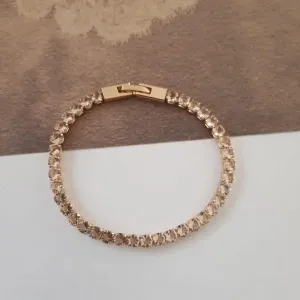 PULSEIRA DOURADA CRAVEJADA EM ZIRCÔNIAS CRISTAL