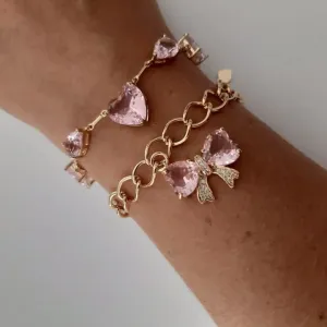 PULSEIRA DOURADA  LAÇO CRAVEJADO MICROZIRCÔNIAS CRISTAL E ZIRCÔNIA ROSA