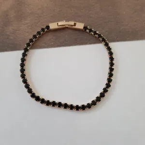 PULSEIRA DOURADA CRAVEJADA EM ZIRCÔNIAS NEGRAS