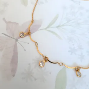 COLAR CHOCKER DOURADO PONTO DE LUZ CRISTAL