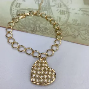 PULSEIRA DOURADA CORAÇÃO CRAVEJADO EM MICROZIRCÔNIAS CRISTAL