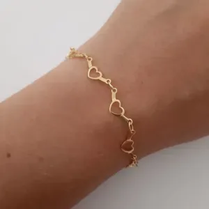 PULSEIRA DOURADA CORAÇÃO VAZADO