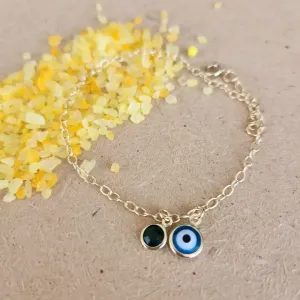 PULSEIRA DOURADA PINGENTES ESMERALDA E OLHO GREGO