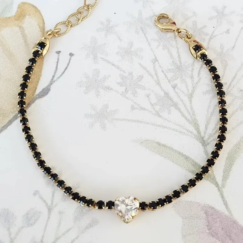 PULSEIRA DOURADA CRAVEJADA EM ZIRCÔNIAS NEGRAS