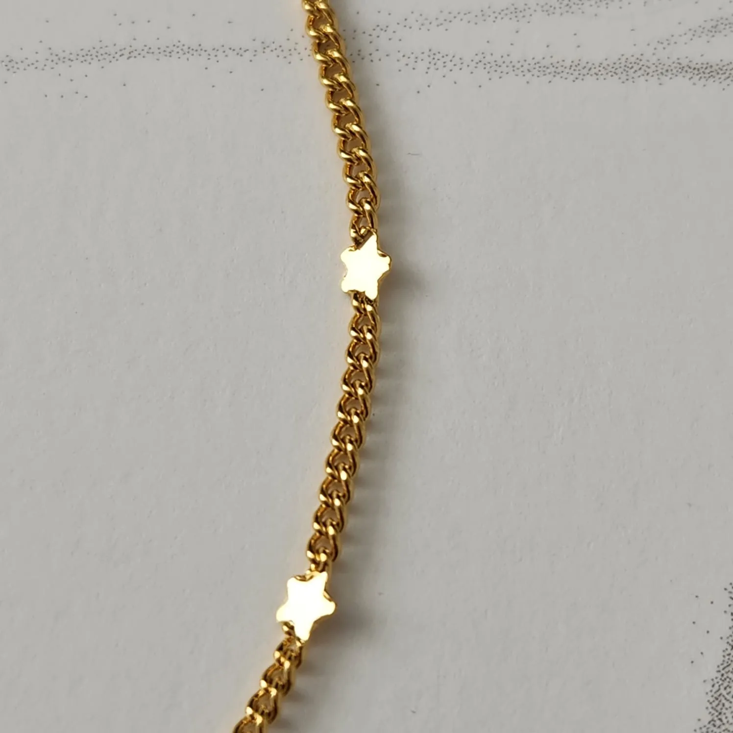 COLAR DOURADO ESTRELAS