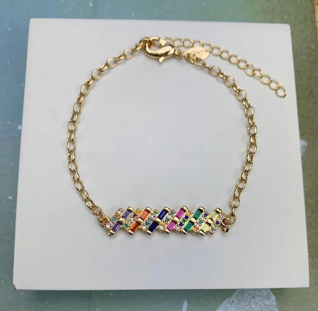 PULSEIRA DOURADA ZIRCÔNIAS NAVETE MULTICOLORIDAS DETALHE MICROZIRCÔNIAS CRISTAL