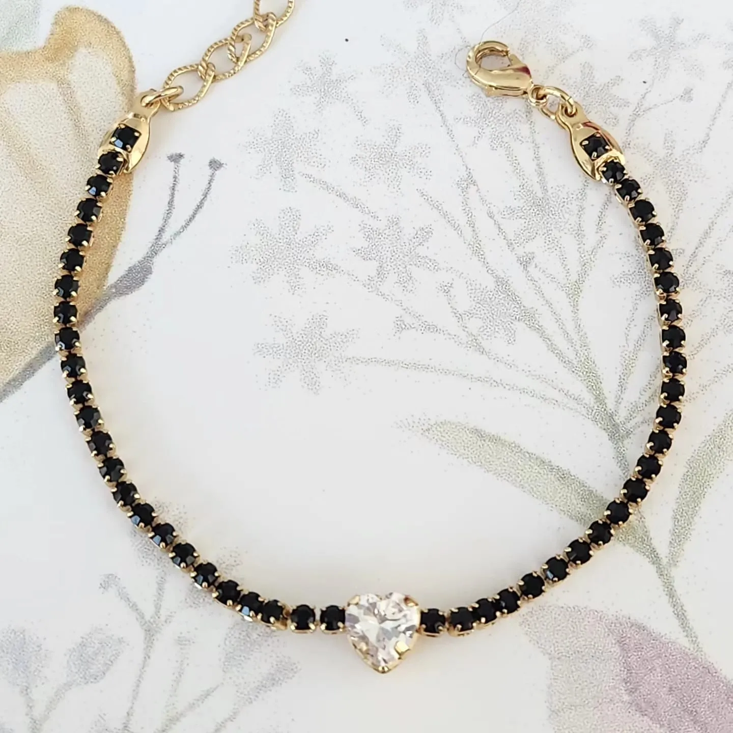 PULSEIRA DOURADA CRAVEJADA EM ZIRCÔNIAS NEGRAS