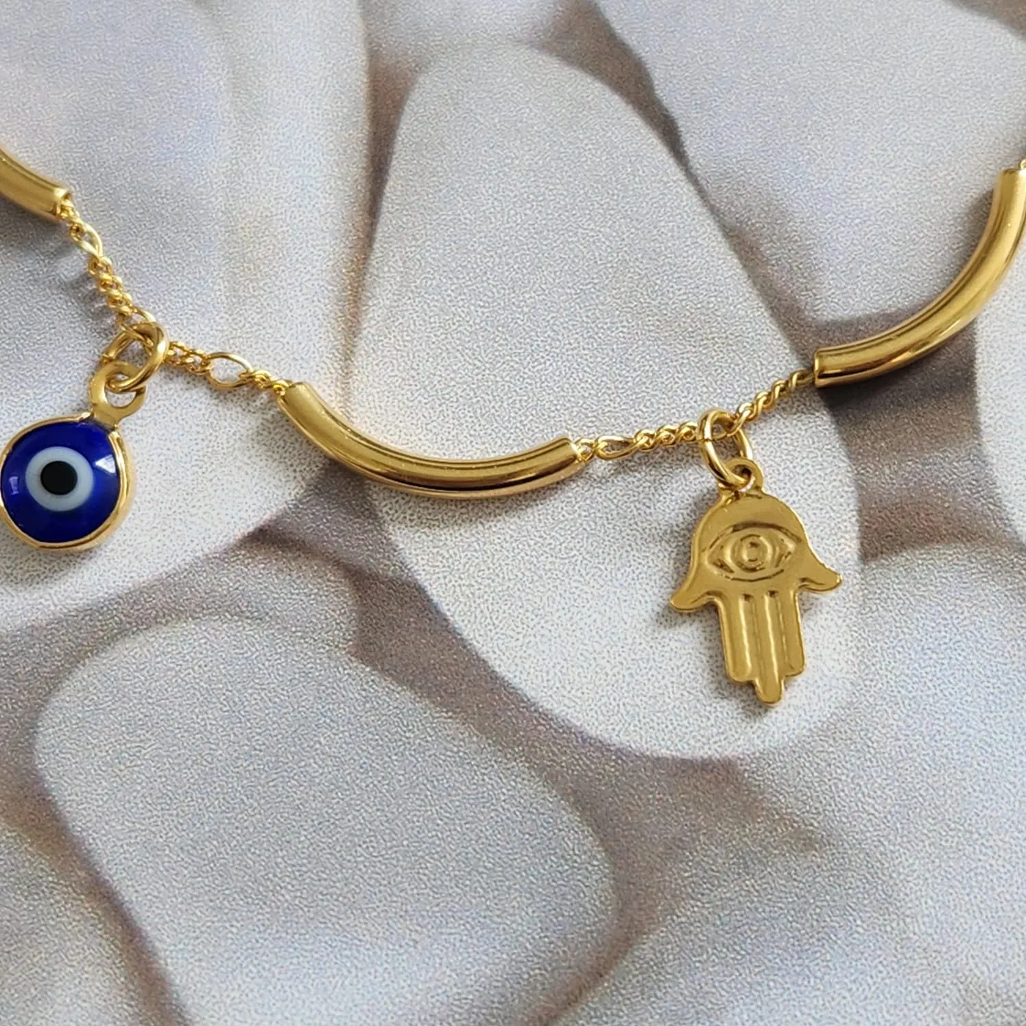 PULSEIRA DOURADA MÃO DE FATIMA E OLHO GREGO