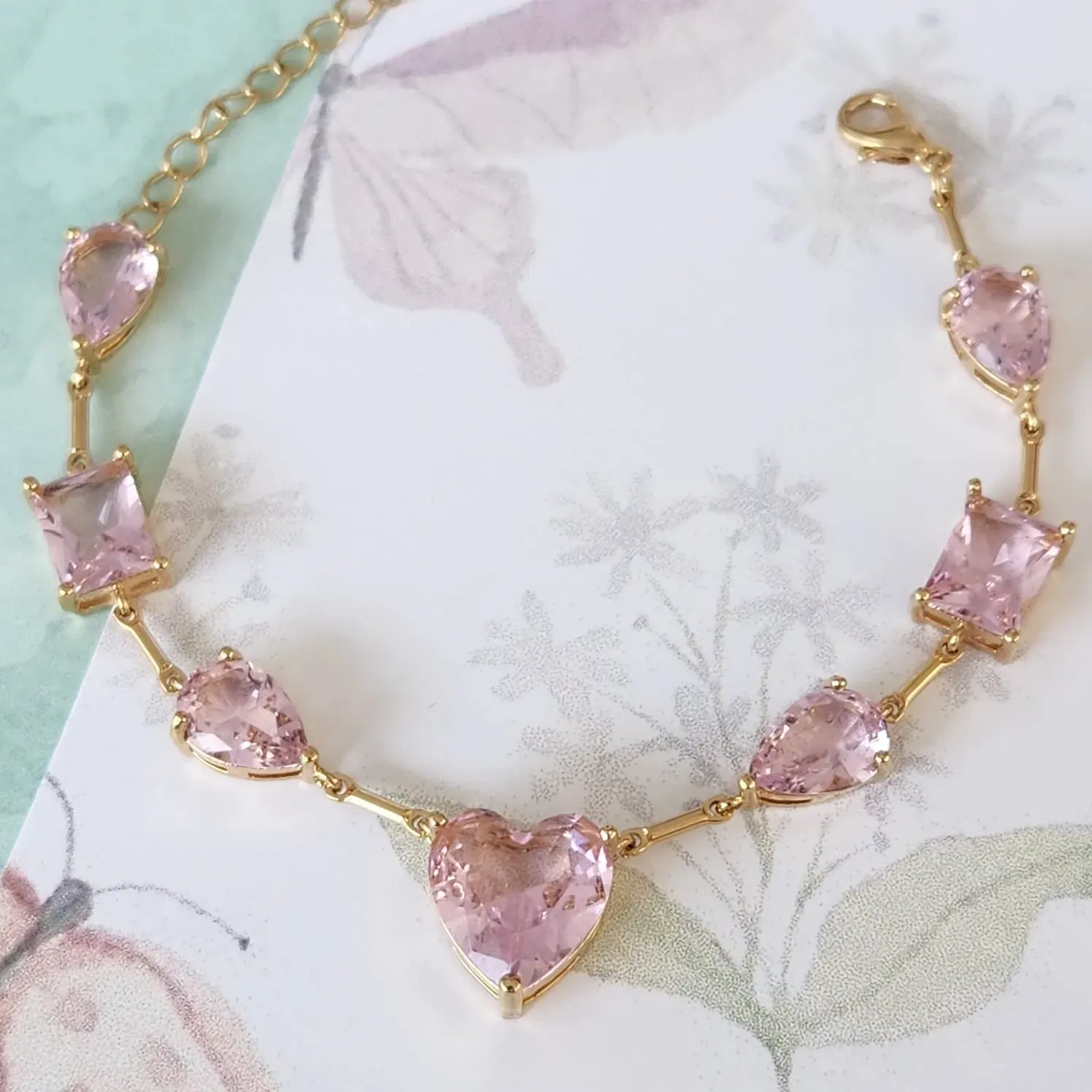 PULSEIRA DOURADA PEDRAS ROSA