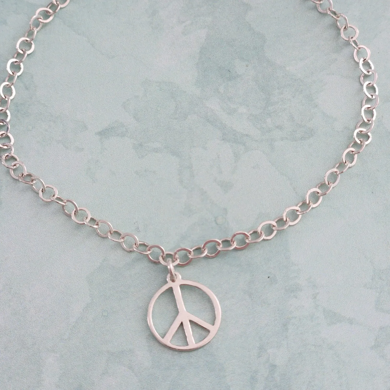 PULSEIRA PRATA 925 PINGENTE SIMBOLO PAZ E AMOR