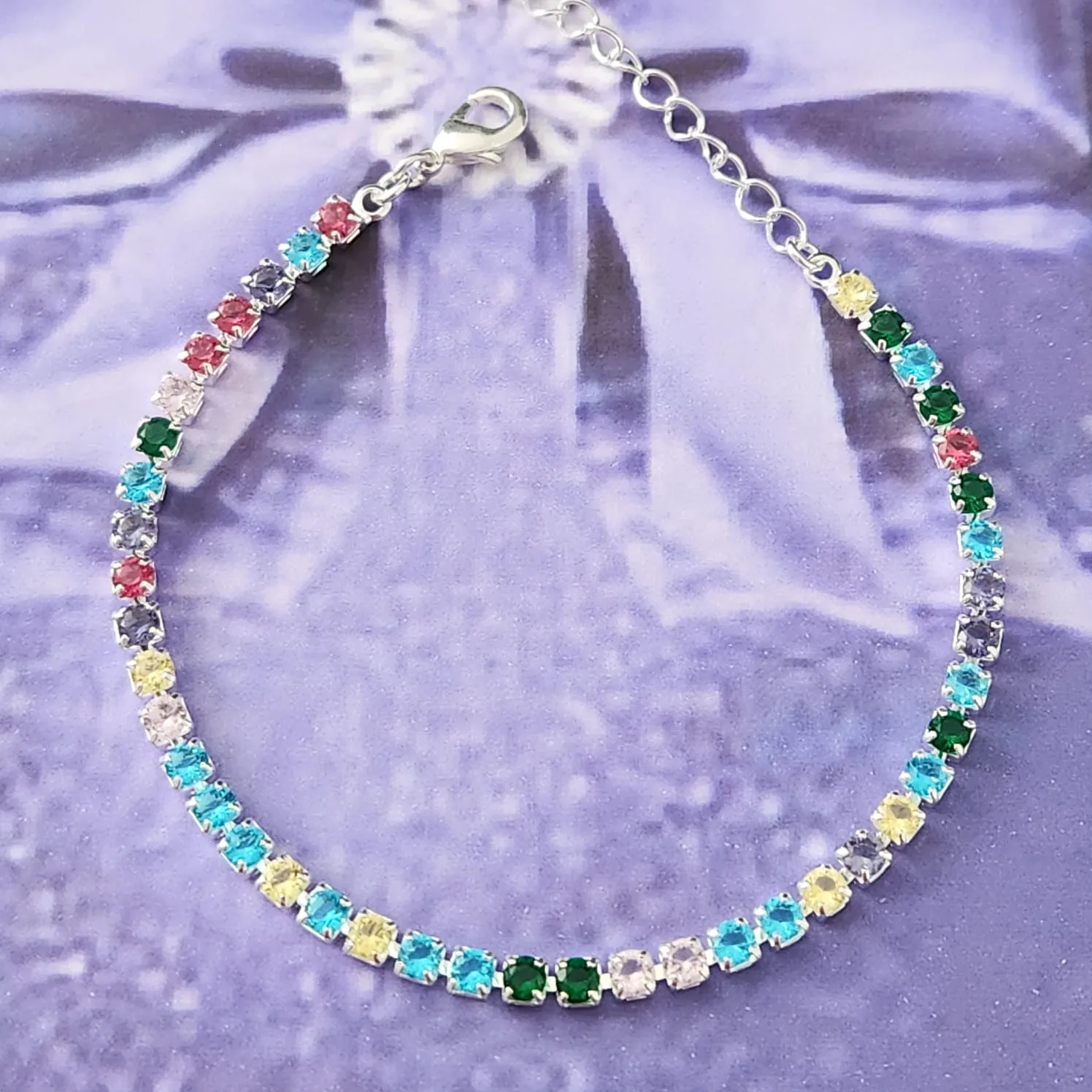 PULSEIRA RIVIERA BANHO DE PRATA ZIRCÔNIAS COLORIDAS