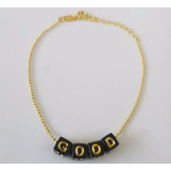 PULSEIRA BOLINHAS COM LETRAS PRETAS GOOD