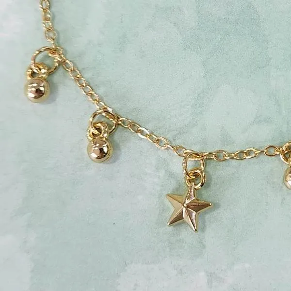 PULSEIRA BOLAS E ESTRELA