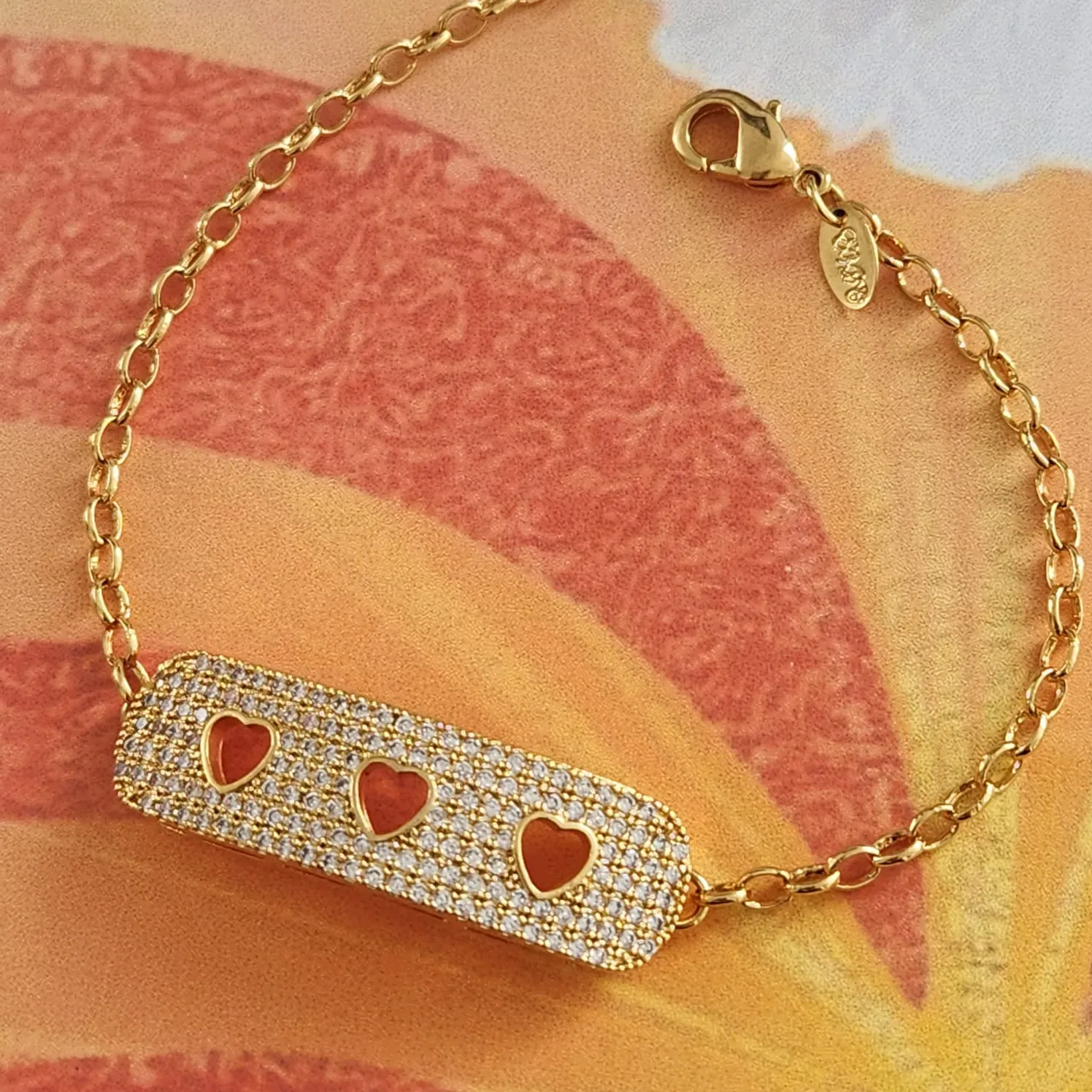 PULSEIRA DOURADA CORAÇÃO CRAVEJADA EM MICROZIRCÔNIAS CRISTAL